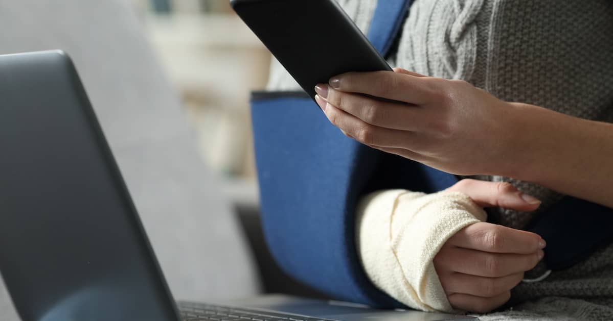 Woman calling a car accident lawyer after an accident