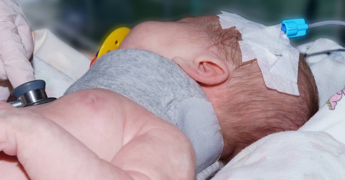 newborn receiving medical care following traumatic birth