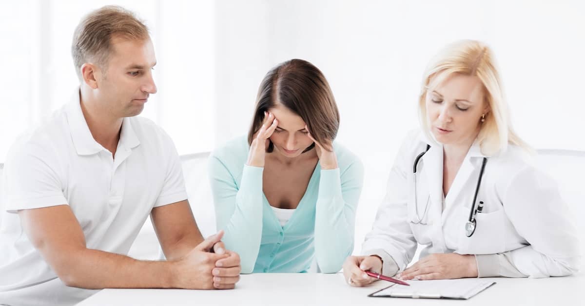 woman upset over a delayed diagnosis of cancer